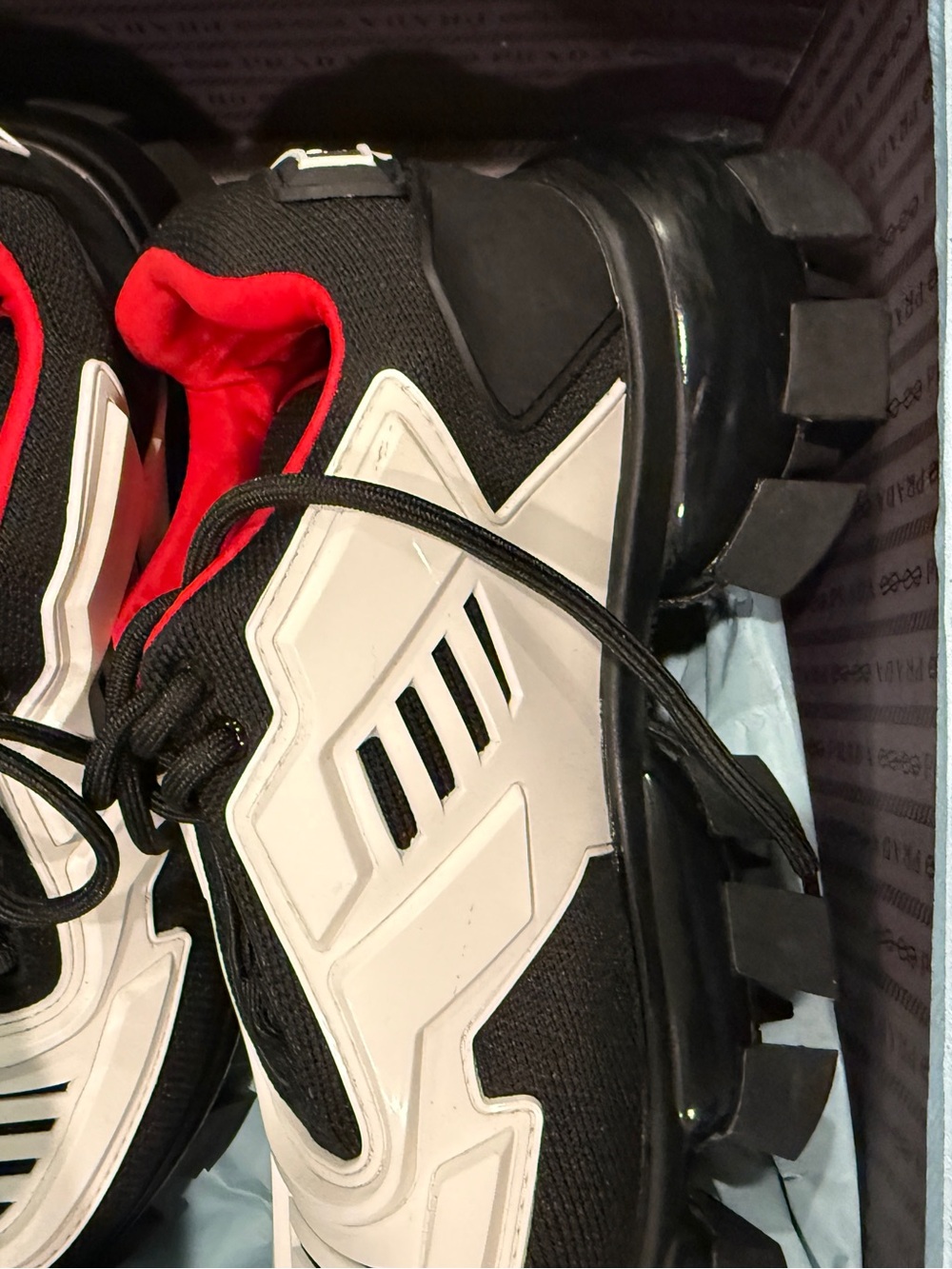Prada  cloud buster black and white sneakers with red inside   new